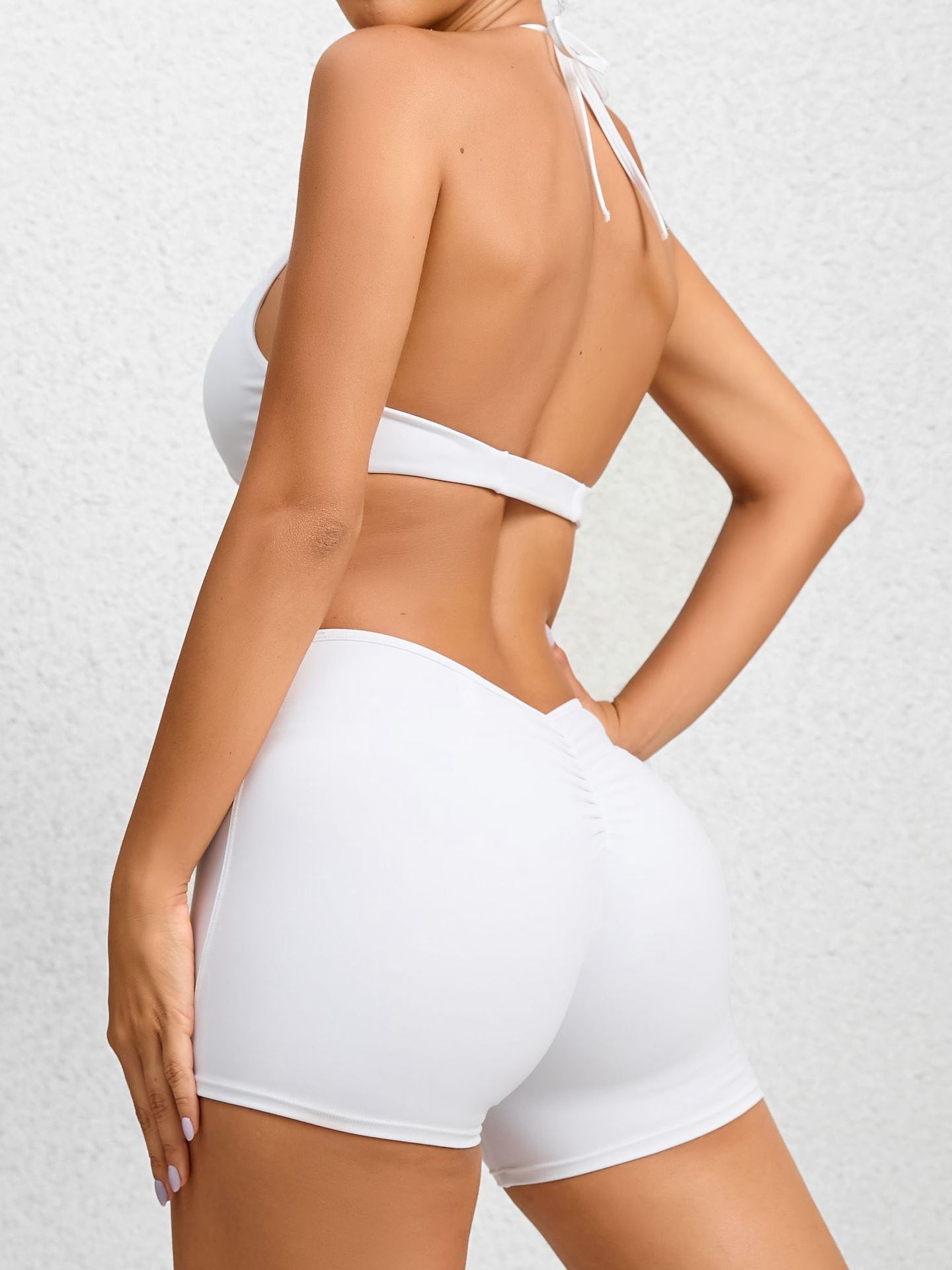 ZASUWA Female Deep V Collar Backless Scrunch Bum Romper